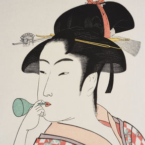 Vintage "Young Woman Blowing a Poppin" Framed Japanese Woodblock Print by Utamaro